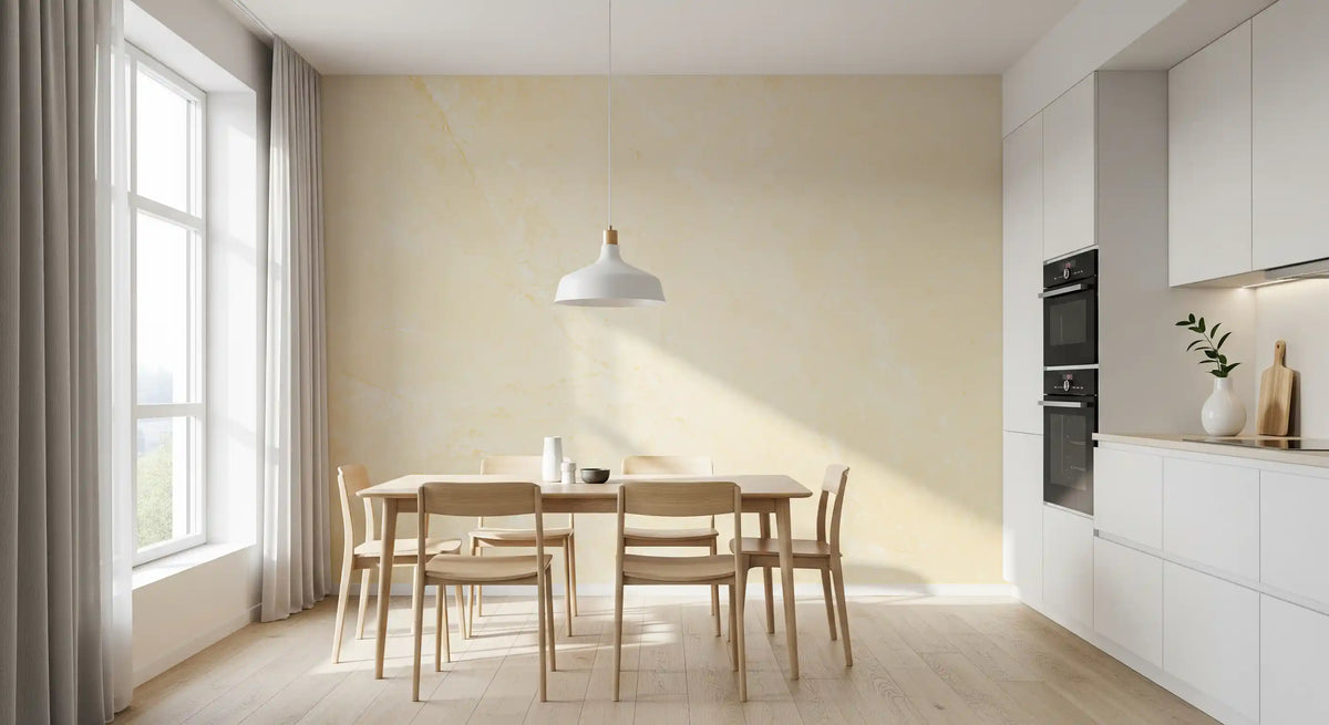 Kitchen diner with oak table, wood chairs and white pendant on cream marble wallpaper GD14189