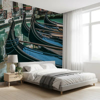 Gondolas mural behind white bed with gray throw and wood nightstand GD14197