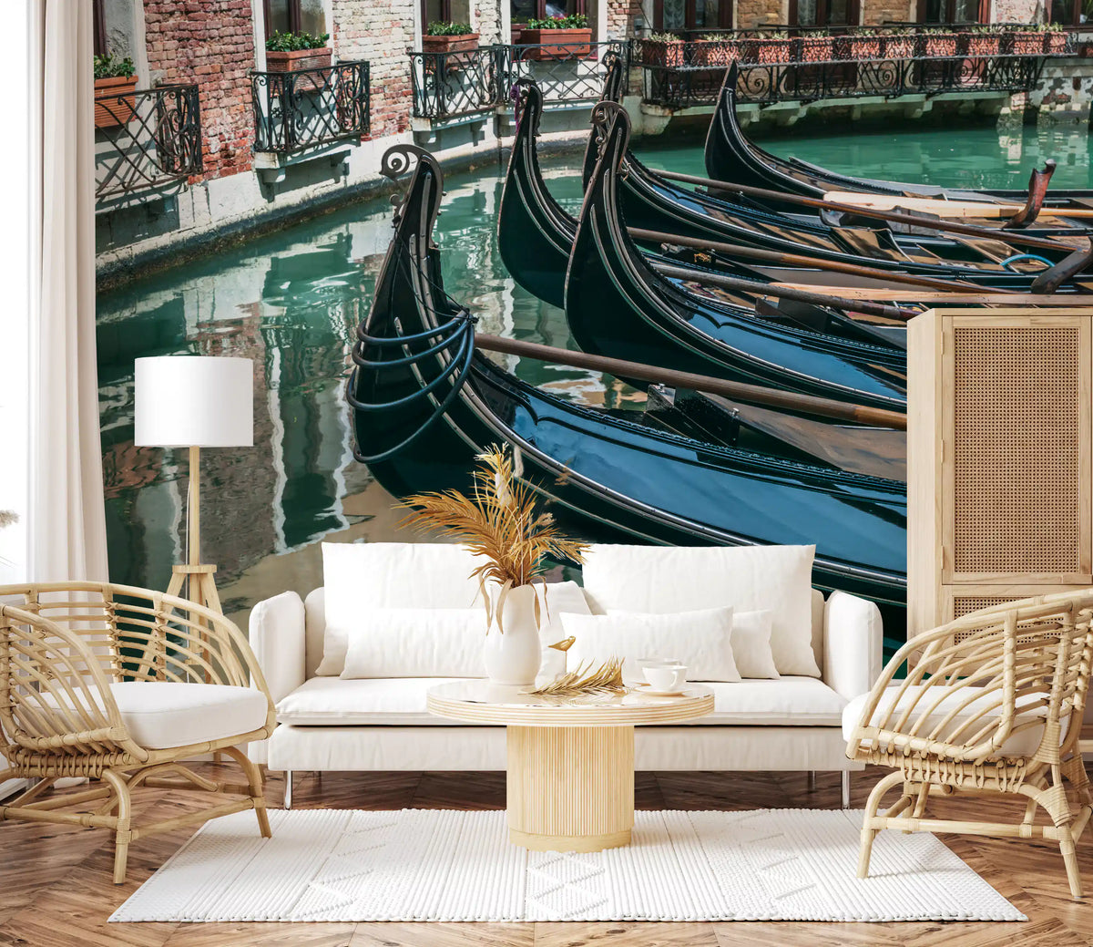 Venice wallpaper behind white sofa with rattan armchairs and round table GD14197
