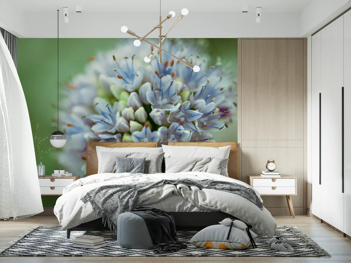 Bedroom with a wood headboard and geometric rug under a blue and green flower mural GD14202