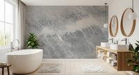 Bathroom with a freestanding tub and round mirrors on a gray stone slab mural GD14203
