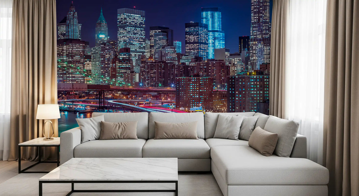 New York wallpaper mural behind a gray sectional, marble coffee table and curtains GD14205