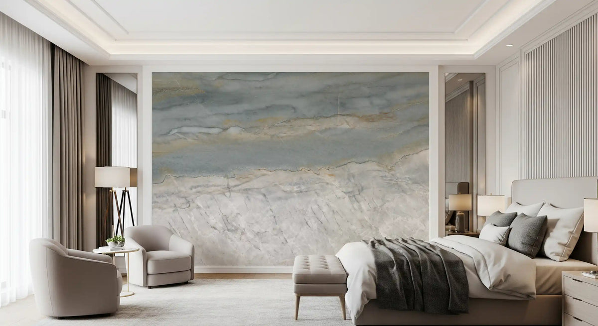 Marble wallpaper behind a hotel style bed with armchairs and a tray ceiling GD14204