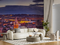 Rome wallpaper behind a cream curved sofa, round coffee table and dotted rug GD14206