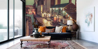 City wallpaper behind a navy velvet sofa, orange cushions and Persian rug GD14208