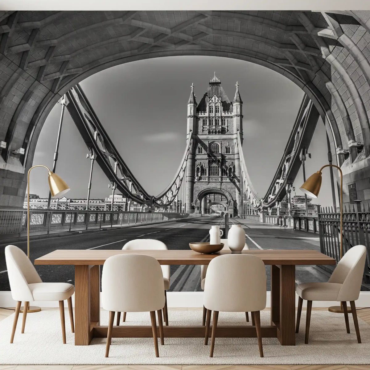 London wallpaper behind a long wood dining table, cream chairs and brass lamps GD14209