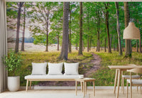 Hallway bench with white cushions, small desk and rattan pendant on forest wallpaper GD14219