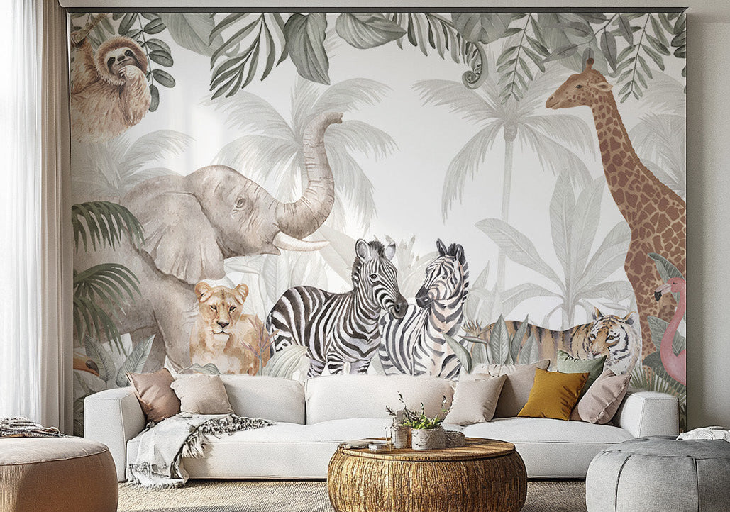 Animal Forest wallpaper mural with a safari elephant, giraffe and zebras among palms behind a white sectional sofa in a living room