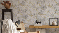 White marble wallpaper with gold vein detail

