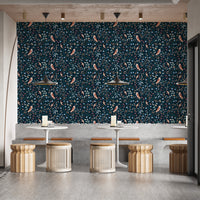 Deep blue wallpaper with bird accents
