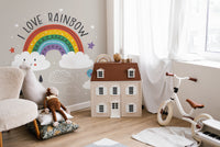 Cartoon-style rainbow and clouds mural
