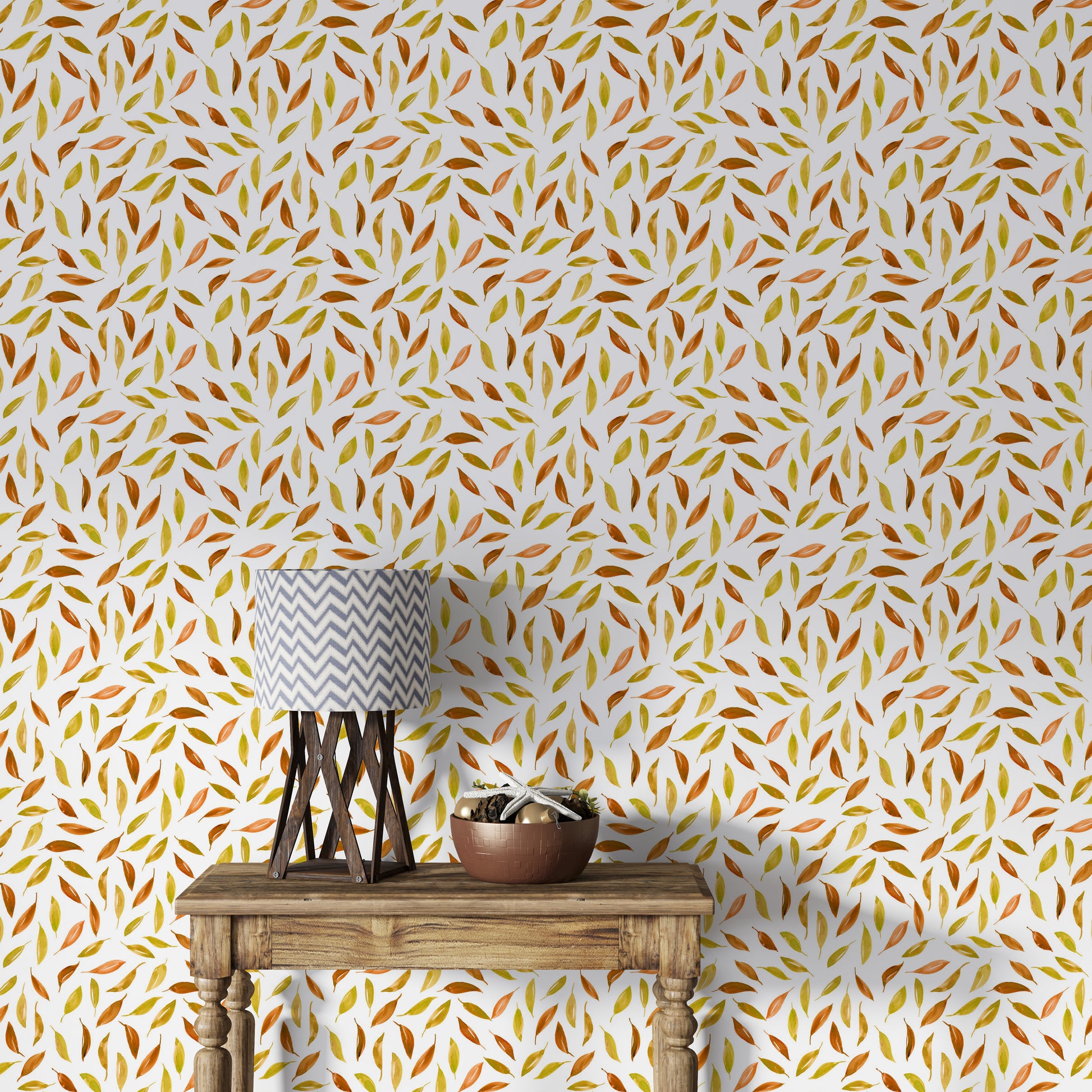Scattered maple leaf wallpaper in amber and sienna

