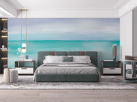 Ocean-inspired wall mural in calming tones for bedroom