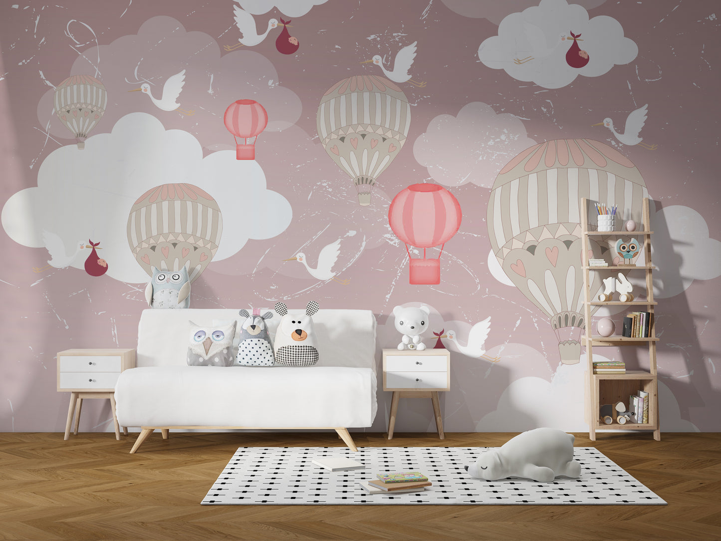 3D Hot Air Balloon wallpaper mural in pink with balloons and storks behind a white daybed with plush toys and ladder shelf