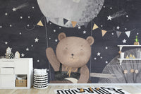 Magical bear and balloon wall mural under a starry night sky.
