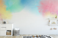 Bright watercolor splash mural wallpaper for kids’ bedroom walls.