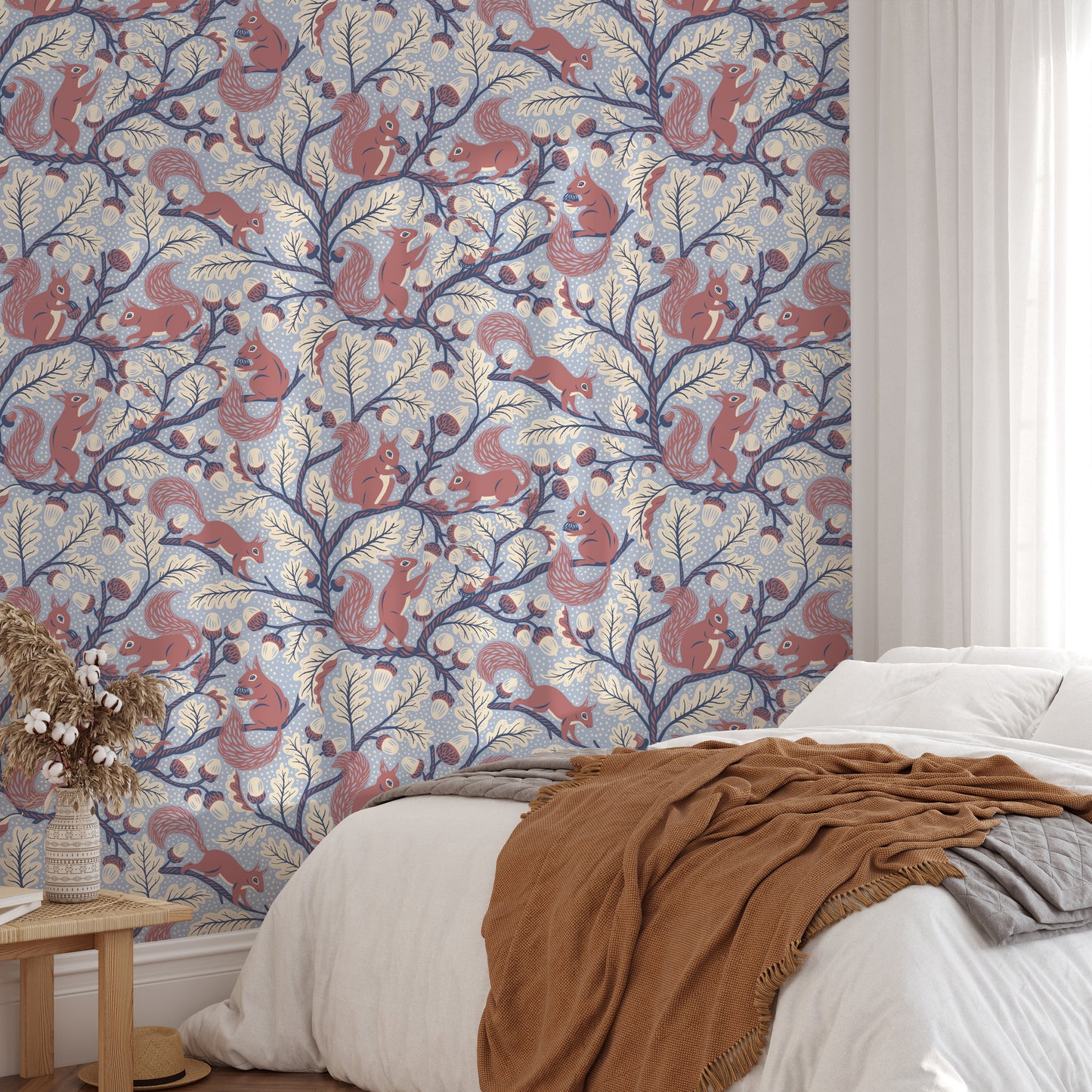 Woodland blue wallpaper with playful squirrels

