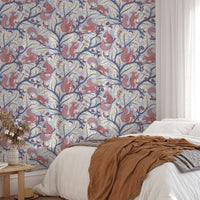 Woodland blue wallpaper with playful squirrels

