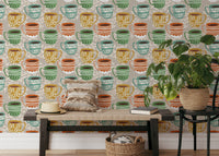 Playful mug prints on grey wallpaper design
