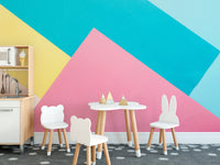 Abstract paper color mural adding depth to stylish wall decor.
