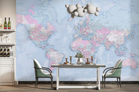 Artistic blue world map wallpaper with a watercolor effect.