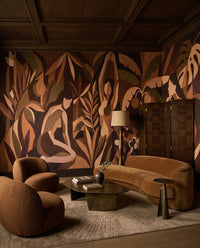 Amber Veil wall mural warms a living room with rust, plum, and sepia figures.