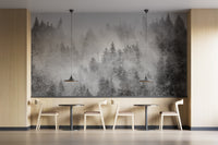 Atmospheric misty pine forest wallpaper design
