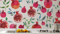 Vibrant pomegranates in soft watercolor strokes
