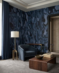 Streaming navy ripples lead into a Living room with the Ettore Burl wall mural.