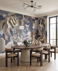 Dining room feature with the figure-led Lunar Eclipse wall mural under a sculptural chandelier.