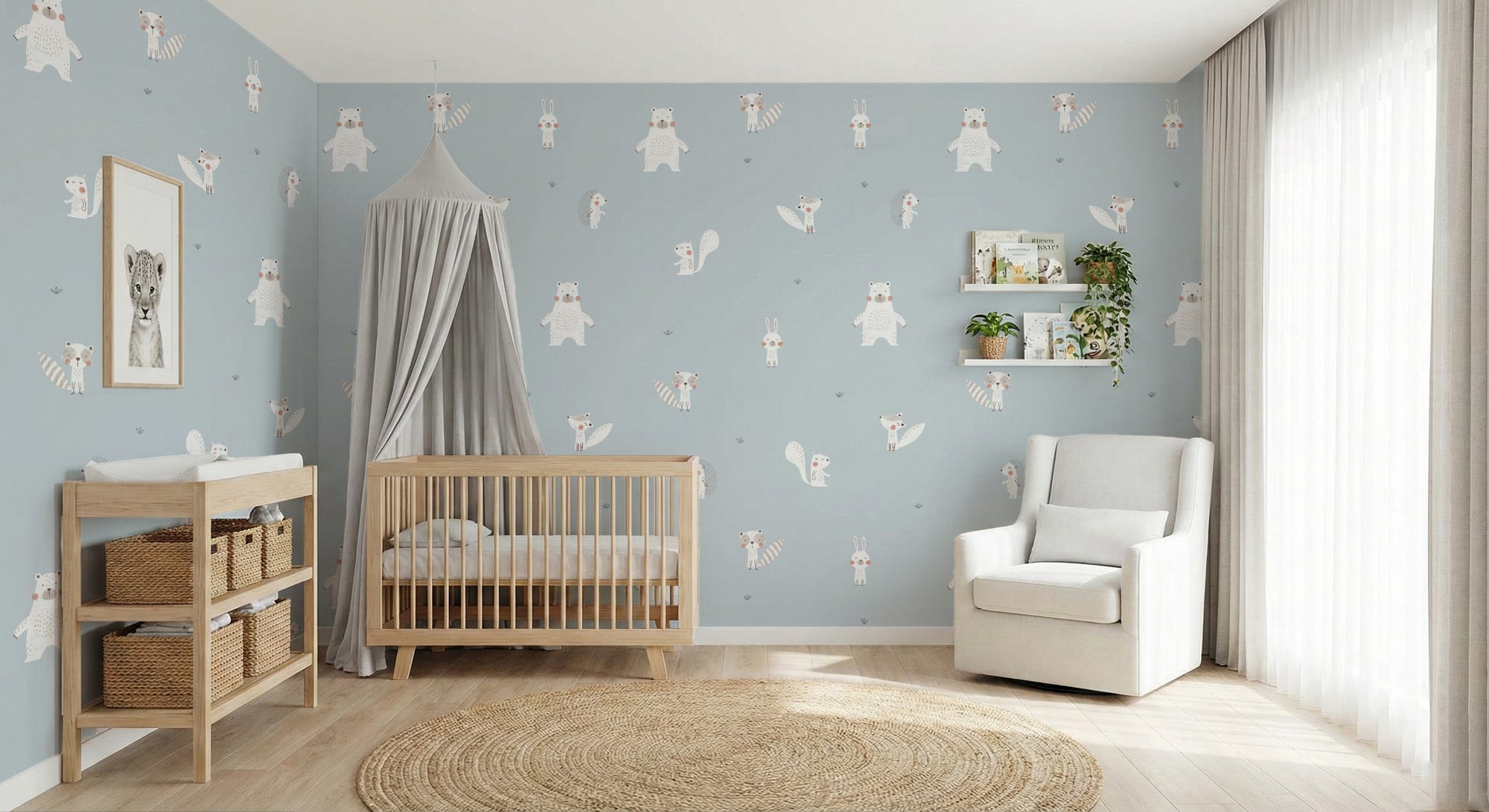 Forest Animals Blue wallpaper of bears and foxes behind a wood crib and white glider in a soft blue nursery