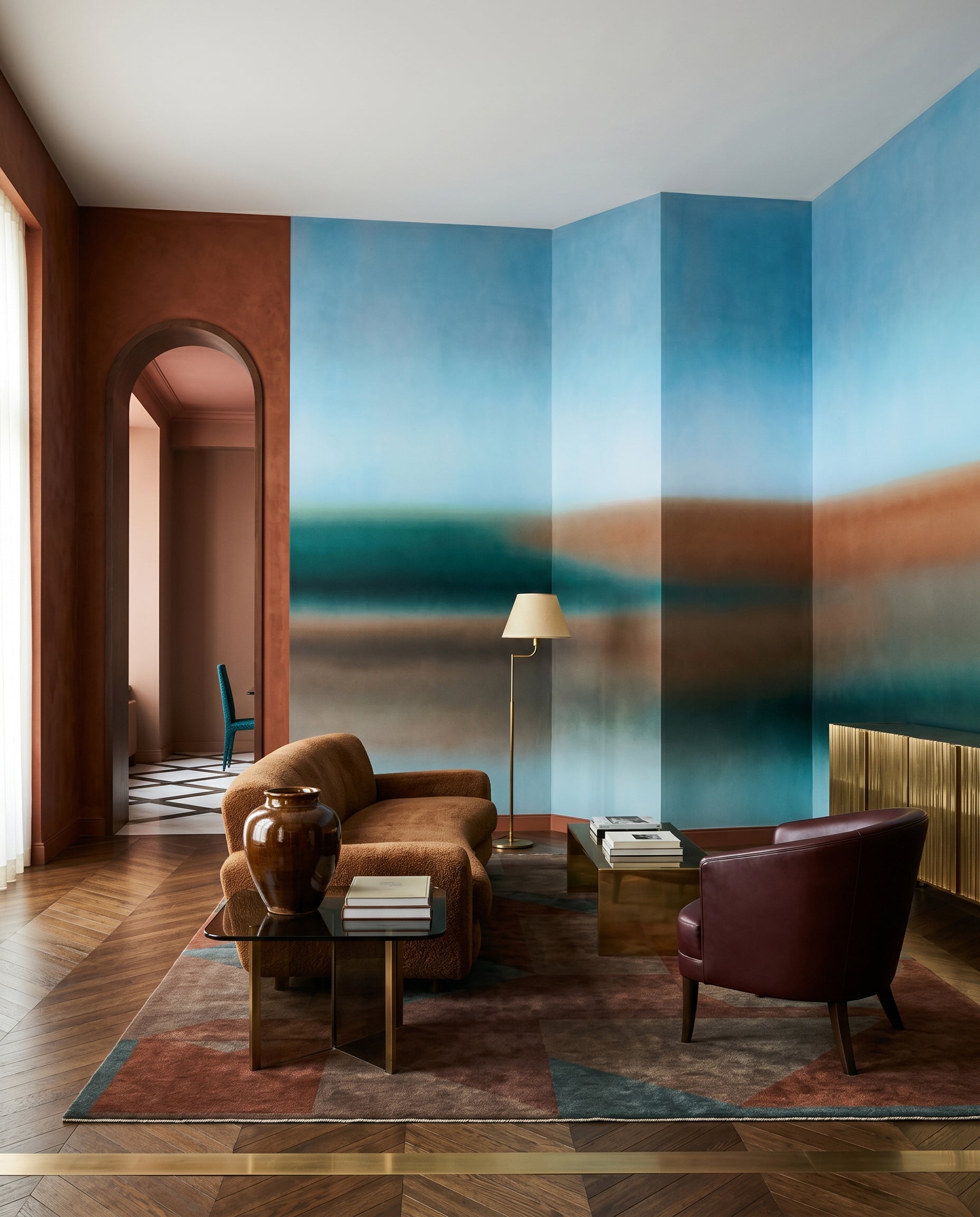 The Rotko Clay wall mural shapes a Living room  with painterly ochre and teal flow.