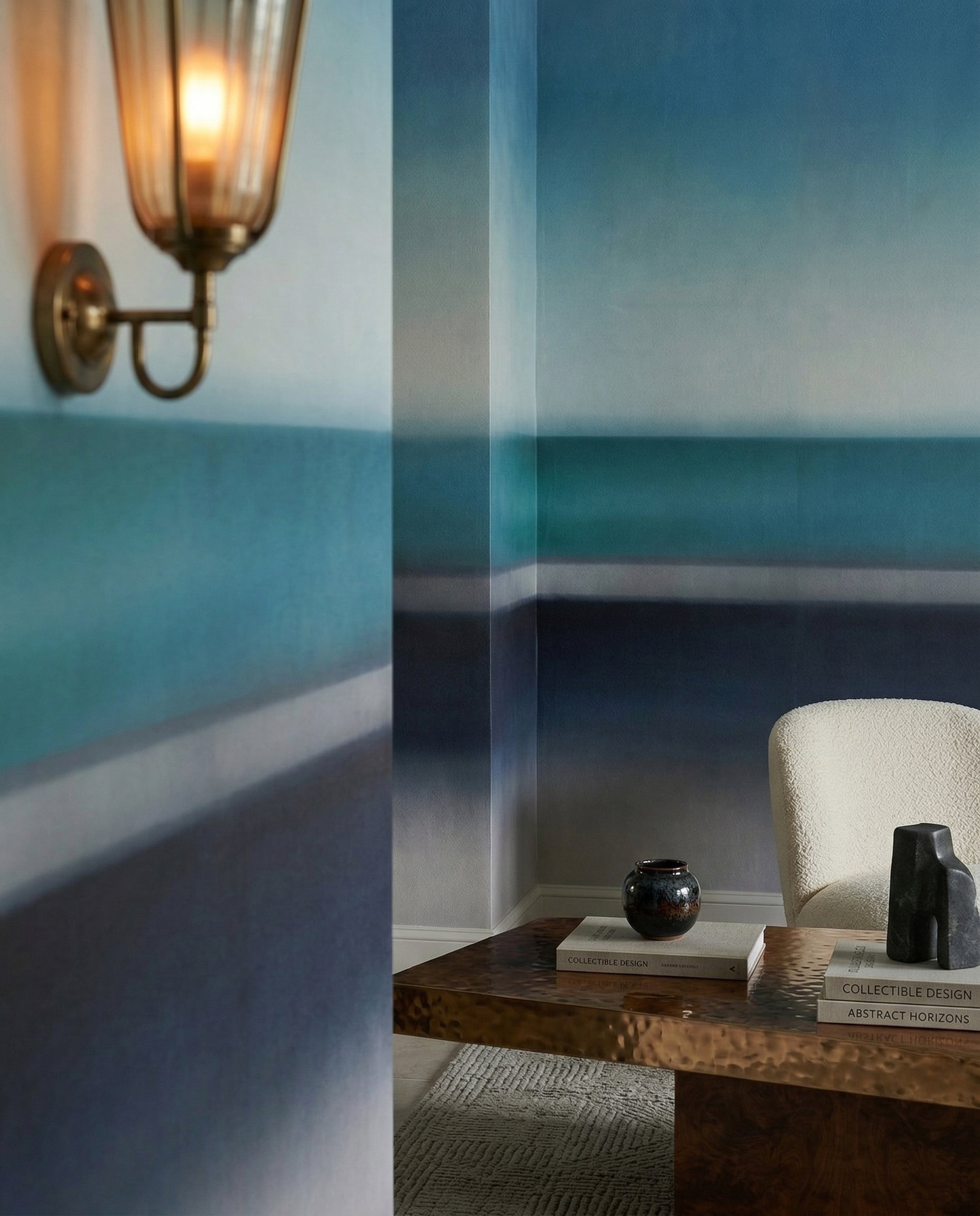 Hazy teal seascape wall mural fills a coastal-feel lounge