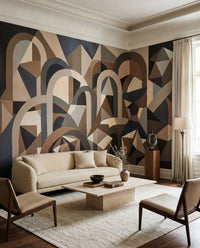 Lounge corner uses the wall mural to carry navy, taupe and warm brown geometry calmly.