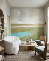Living room paired with the brushy Velvet Dawn wall mural and pale meadow tones.