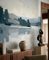 Cool blues fill a hallway corner under the lakeside wall mural panel.