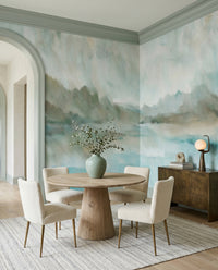 Dining area where painterly teal water of Velvet Horizon wall mural