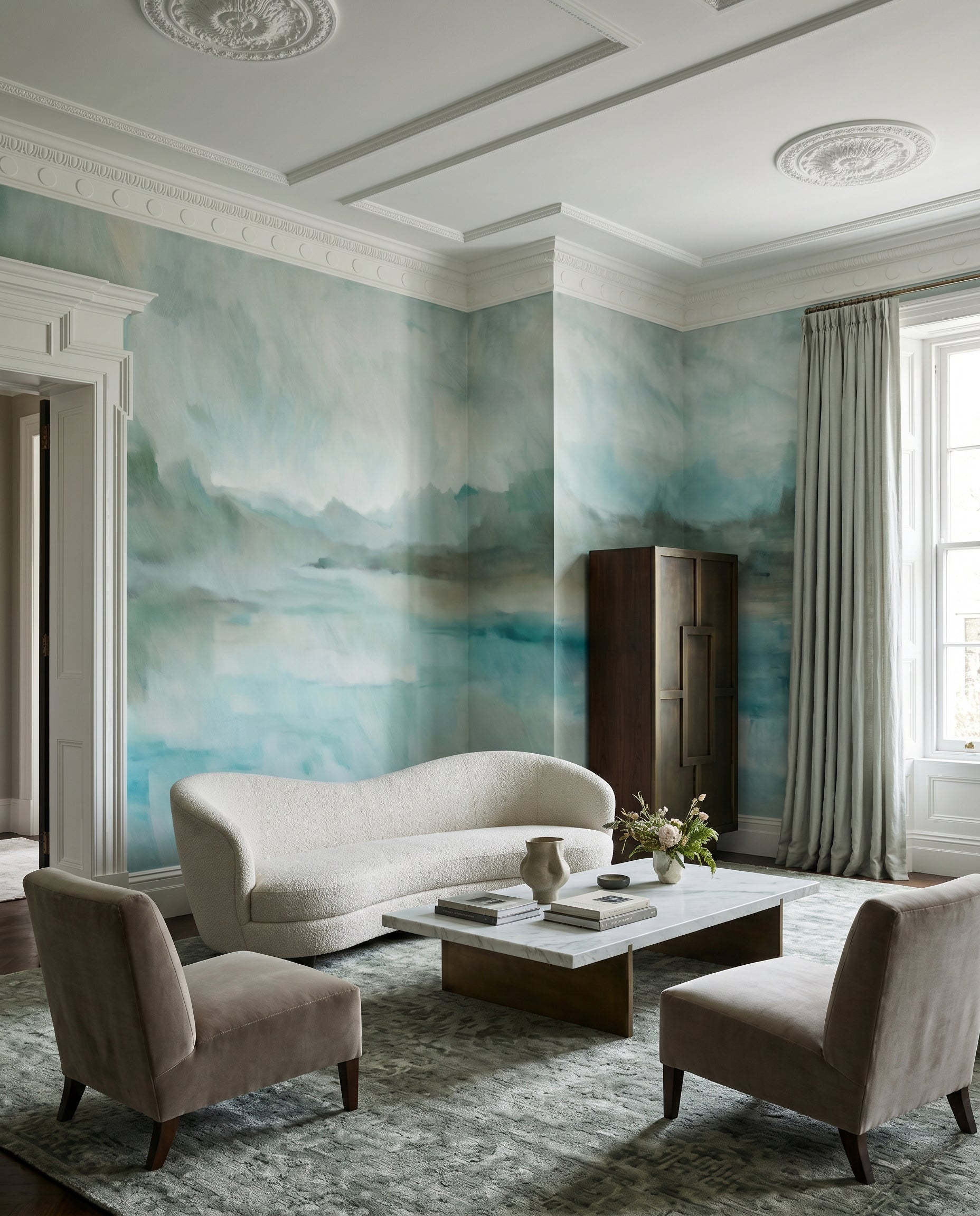 Lounge backed by the soft ridges and turquoise reflections of this wall mural