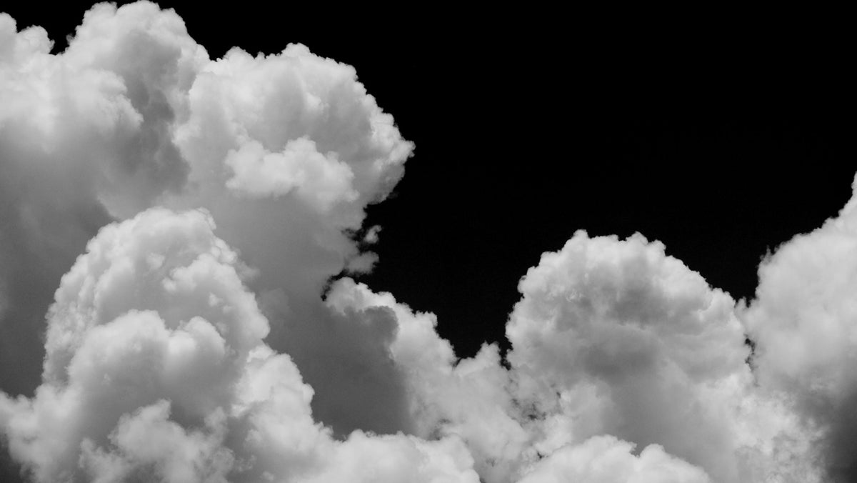 Black and white Clouds Wallpaper Mural in your room — zoomed