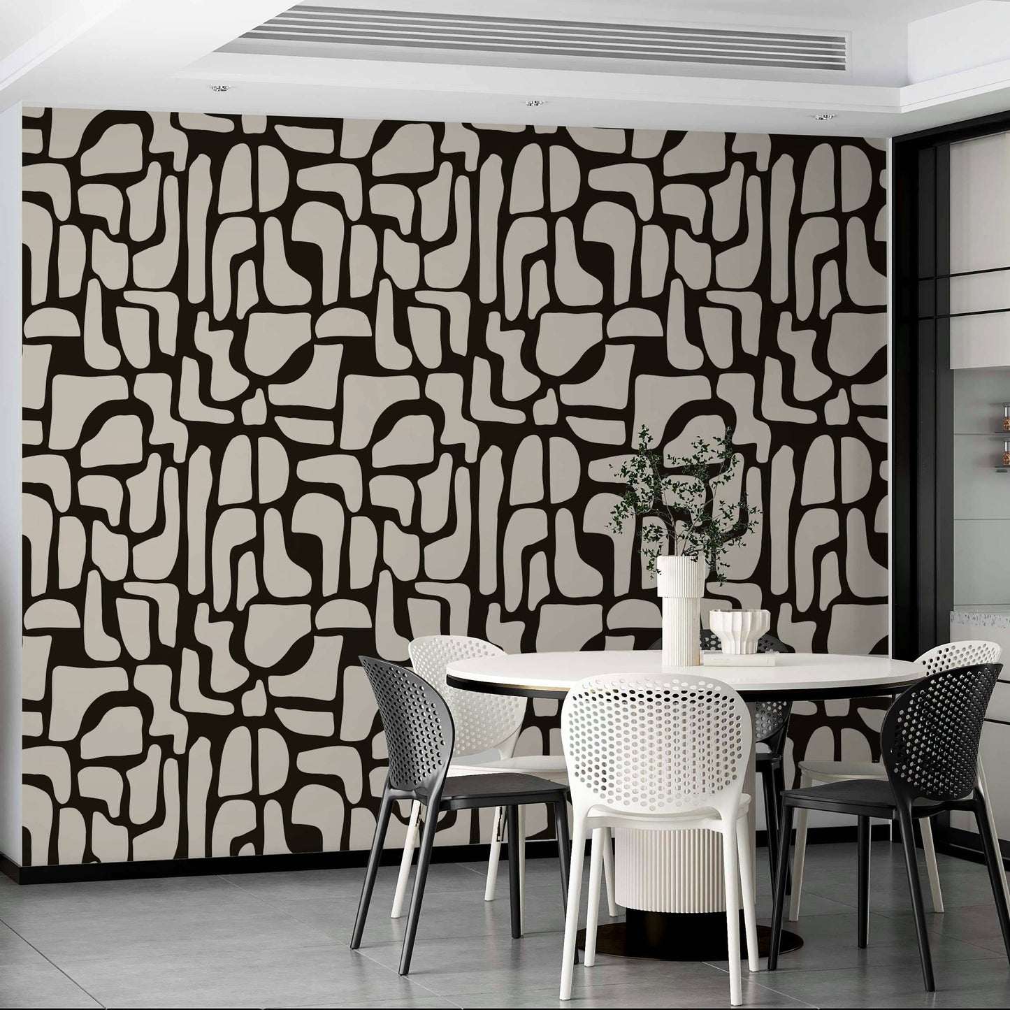 An angled shot of a wall with abstract wallpaper

