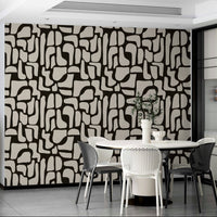 An angled shot of a wall with abstract wallpaper

