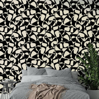 The design is an abstract composition of large geometric shapes.
