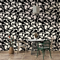 The background of the wallpaper is a light, neutral grey.
