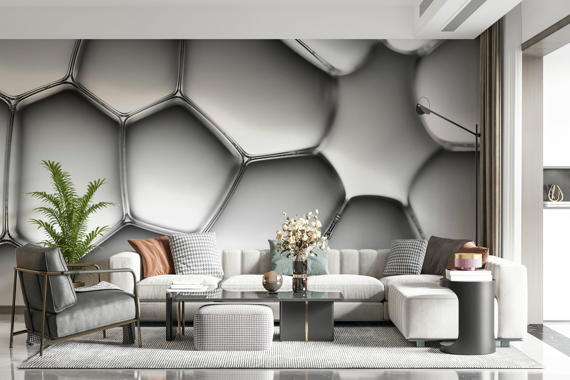 Abstract Cell Structure wallpaper mural in silver 3D bubbles above a white sectional and grey armchair in a living room