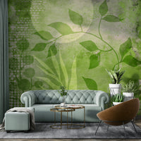 Mixed media mural with layered natural shapes

