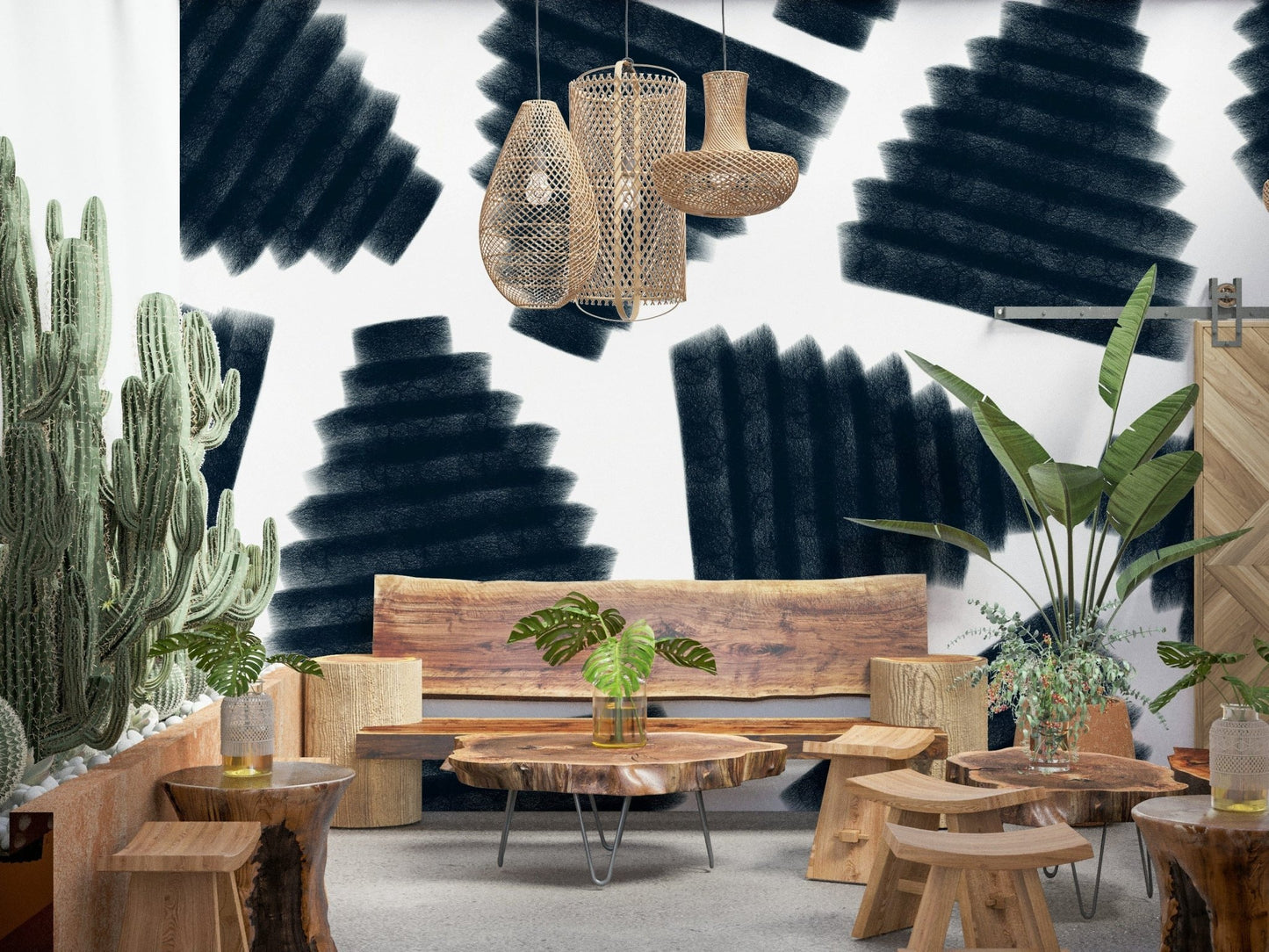 Abstract Indigo wallpaper mural of brushed navy fan shapes on white behind a live-edge wood bench in a boho lounge