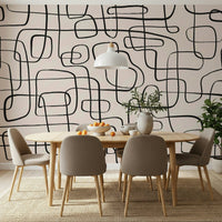 An artistic flowing abstract mural on minimalist wallpaper.