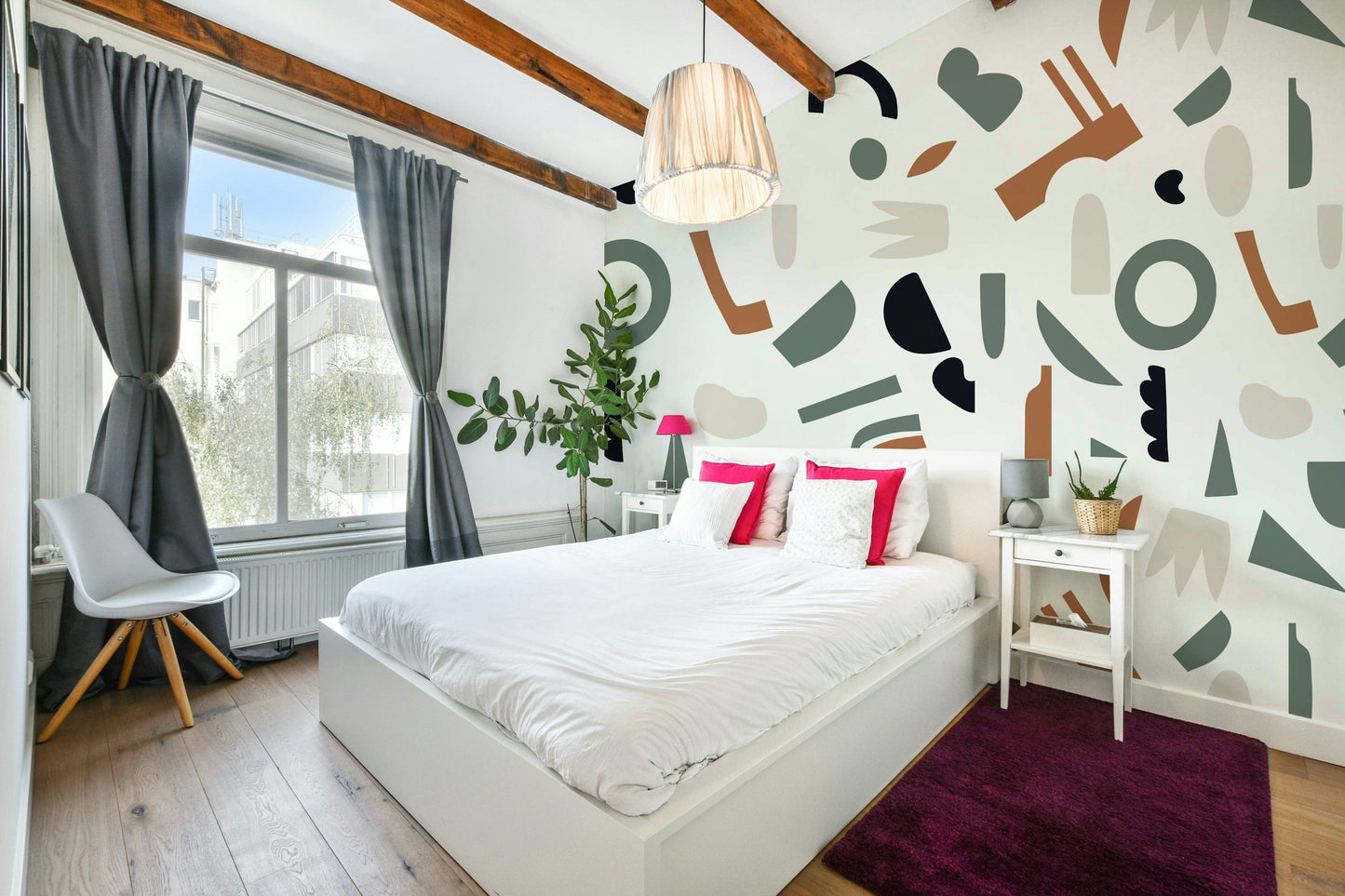 A peaceful wall mural with a modern, organic design.

