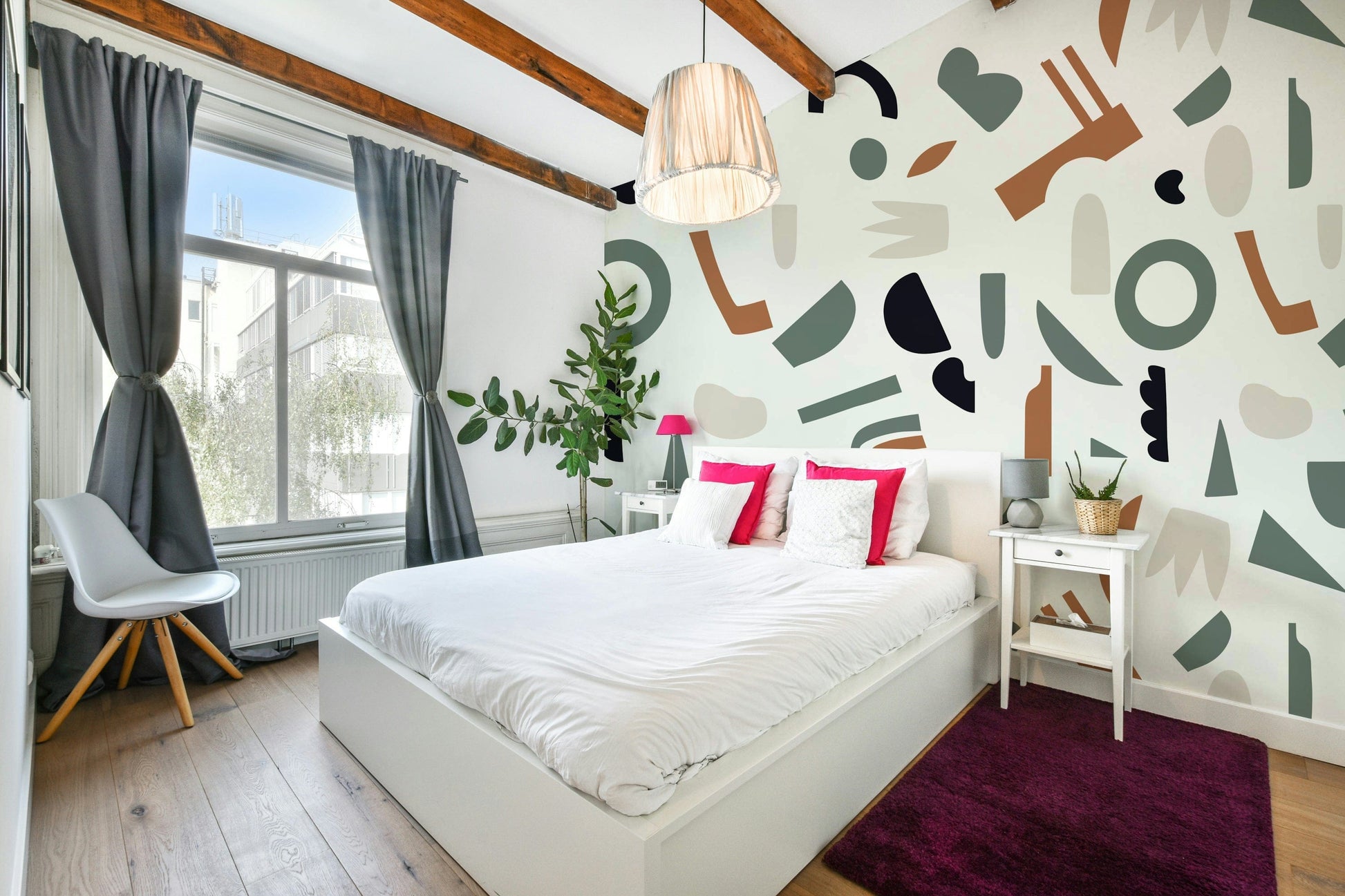 A peaceful wall mural with a modern, organic design.

