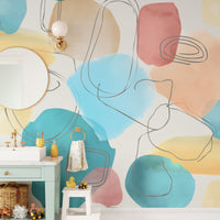Abstract Shapes in Watercolor colorful wallpaper mural as a feature wall in a home office workspace in a multicolour palette